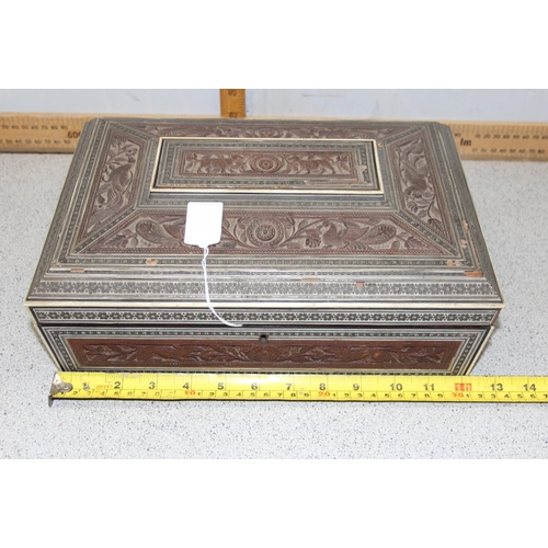 294 - A 19th century Anglo-Indian Vizagapatam work box with sadeli inlay and carved details, approx 32cm w... 