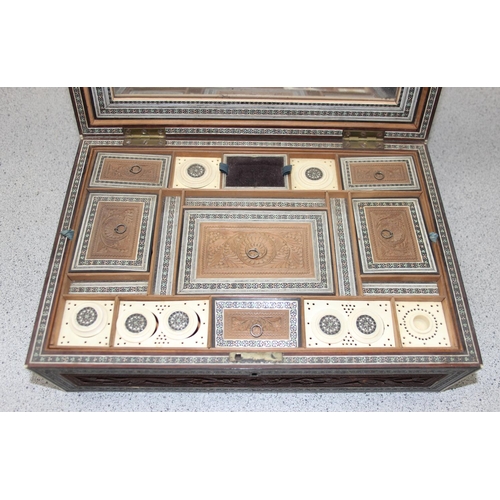 294 - A 19th century Anglo-Indian Vizagapatam work box with sadeli inlay and carved details, approx 32cm w... 