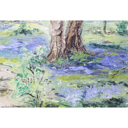 414 - Textured oil on canvas of bluebells in a forest, indistinctly signed