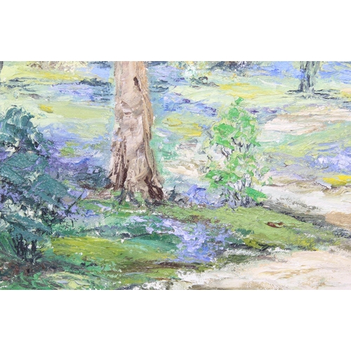 414 - Textured oil on canvas of bluebells in a forest, indistinctly signed