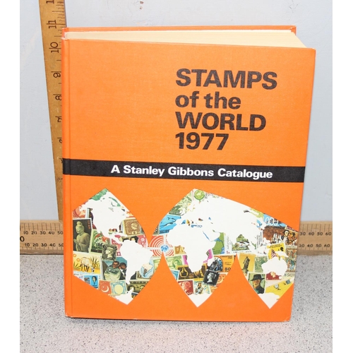 502 - 4 Stamp albums with contents, 1 empty stock books & two stamp refence books.