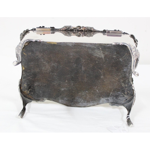 1027 - An impressive large silver jewellery casket with embossed Reynold's Angels decoration and scrolled e... 