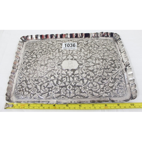 1036 - A large silver tray, likely Indian in origin, unmarked but XRF tested approx 94% purity, approx 27cm... 