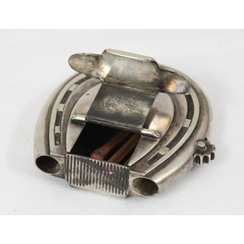 1050 - An Edwardian novelty silver plated vesta case formed as a horseshoe by HJ & Co