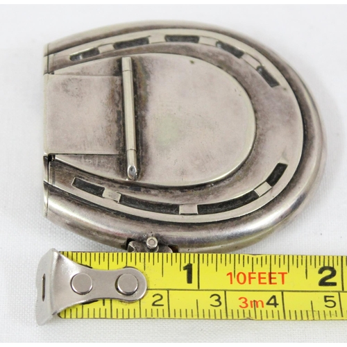 1050 - An Edwardian novelty silver plated vesta case formed as a horseshoe by HJ & Co