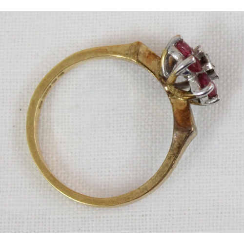 1102 - 18ct gold floral set ring with a central diamond surrounded by 6 rubies, London 1976, approx size N,... 