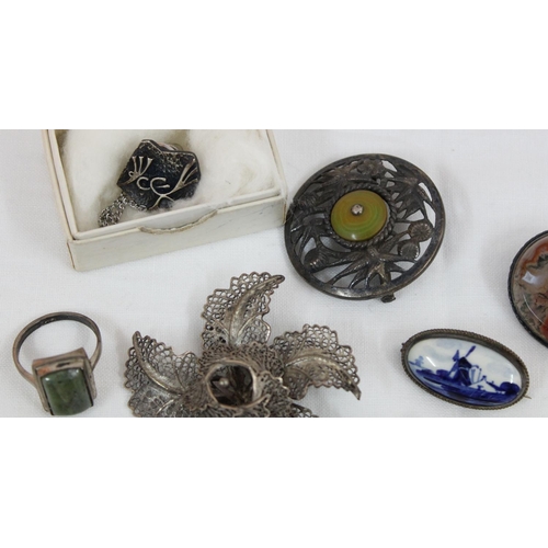 1109 - Qty of assorted silver mounted brooches, earrings, and a ring etc, all marked & XRF tested