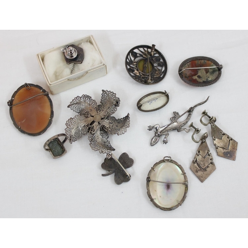 1109 - Qty of assorted silver mounted brooches, earrings, and a ring etc, all marked & XRF tested