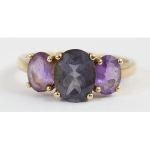 1124 - A 9ct gold ring set with 3 large amethysts, approx size S, approx 2.79g gross