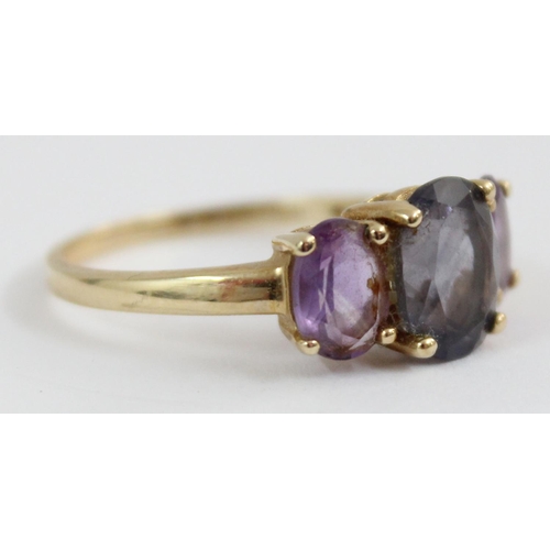 1124 - A 9ct gold ring set with 3 large amethysts, approx size S, approx 2.79g gross