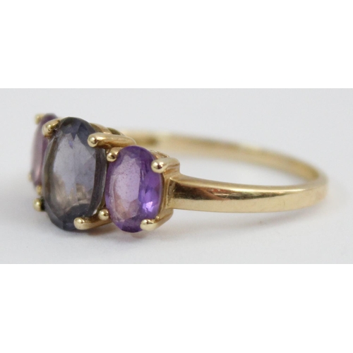 1124 - A 9ct gold ring set with 3 large amethysts, approx size S, approx 2.79g gross