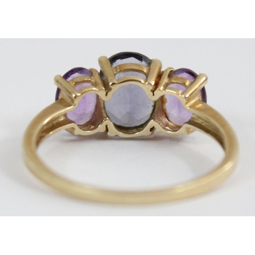 1124 - A 9ct gold ring set with 3 large amethysts, approx size S, approx 2.79g gross