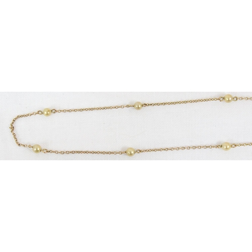 1138 - A long 9ct gold and seed pearl necklace, clasp marked 9ct and XRF confirmed, approx 5.76g gross, app... 