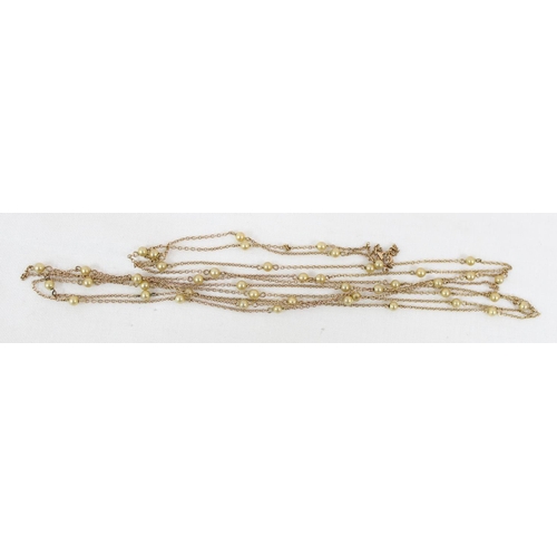 1138 - A long 9ct gold and seed pearl necklace, clasp marked 9ct and XRF confirmed, approx 5.76g gross, app... 