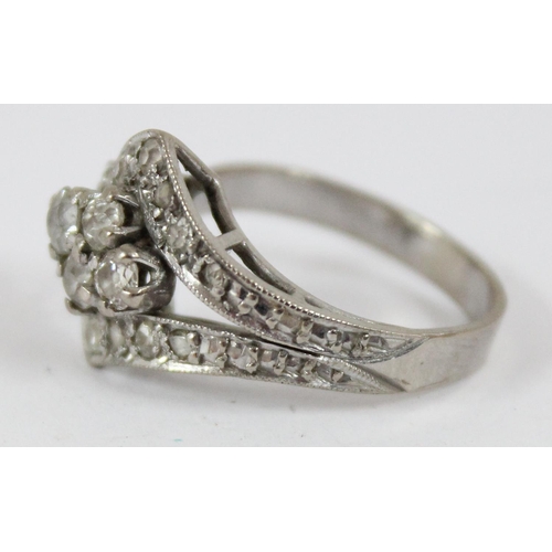 1146 - 18ct white gold and diamond set ring formed as a strap and button, shank marked 18ct and XRF confirm... 