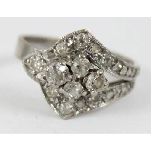 1146 - 18ct white gold and diamond set ring formed as a strap and button, shank marked 18ct and XRF confirm... 