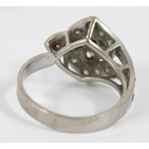 1146 - 18ct white gold and diamond set ring formed as a strap and button, shank marked 18ct and XRF confirm... 