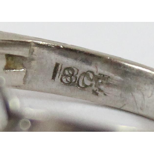 1146 - 18ct white gold and diamond set ring formed as a strap and button, shank marked 18ct and XRF confirm... 