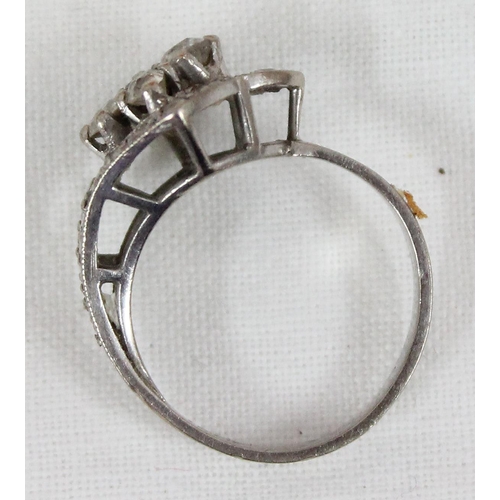 1146 - 18ct white gold and diamond set ring formed as a strap and button, shank marked 18ct and XRF confirm... 