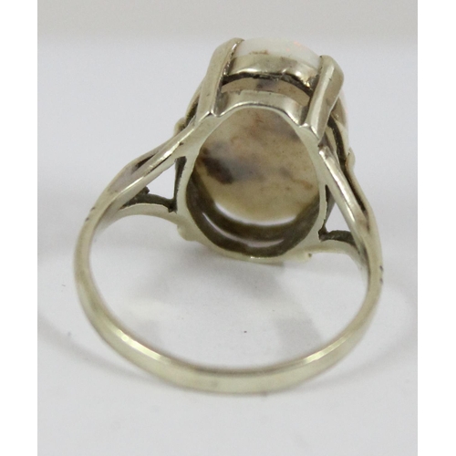 1148 - A 9ct gold and opal set ring, marks rubbed but XRF confirmed as 9ct gold, approx size N, approx 3.32... 