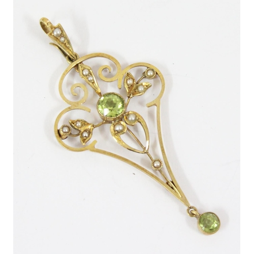 1161 - An Edwardian 15ct gold Art Nouveau pendant set with seed pearls and peridot, approx 60mm tall, appro... 