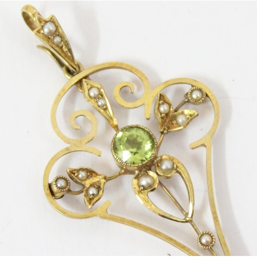 1161 - An Edwardian 15ct gold Art Nouveau pendant set with seed pearls and peridot, approx 60mm tall, appro... 