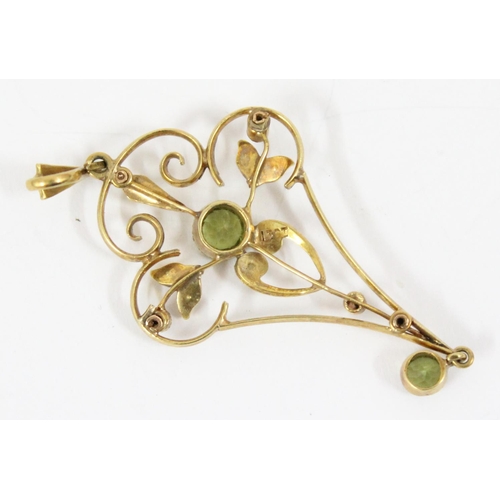 1161 - An Edwardian 15ct gold Art Nouveau pendant set with seed pearls and peridot, approx 60mm tall, appro... 