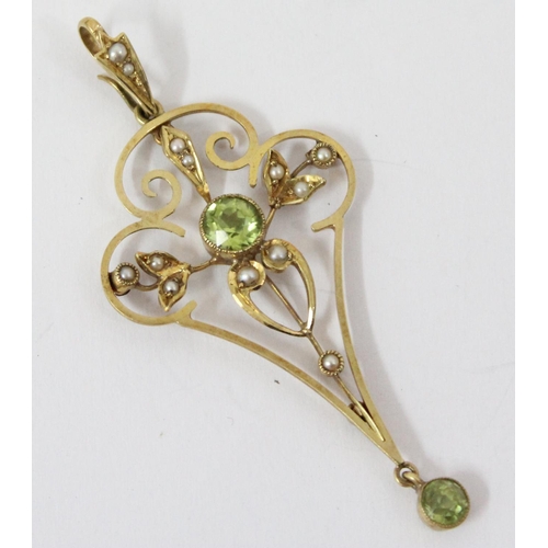 1161 - An Edwardian 15ct gold Art Nouveau pendant set with seed pearls and peridot, approx 60mm tall, appro... 