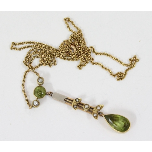 1162 - An Edwardian 15ct gold Art Nouveau pendant set with seed pearls and peridot, on 15ct gold chain, app... 