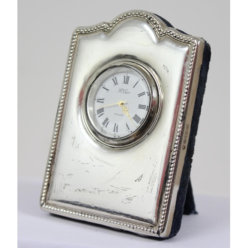 1309 - A silver easel clock by Carrs of Sheffield, marked for 1995, approx 9cm tall