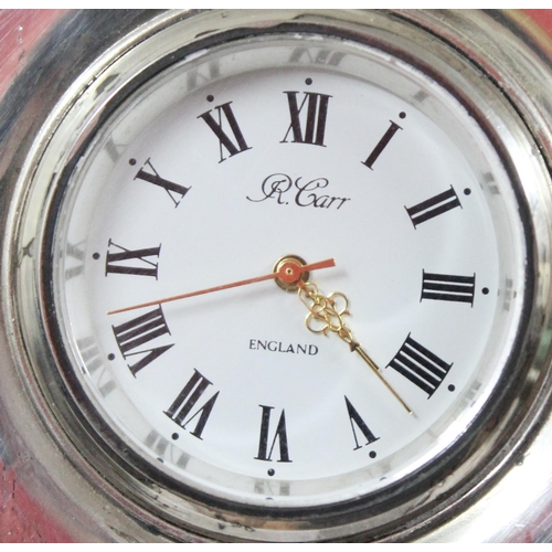 1309 - A silver easel clock by Carrs of Sheffield, marked for 1995, approx 9cm tall