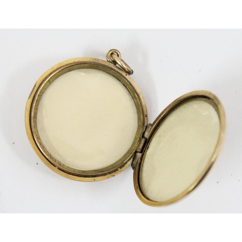 1433 - An early 20th century rolled gold sweetheart locket with enamel RAF crest, approx 27mm in diameter