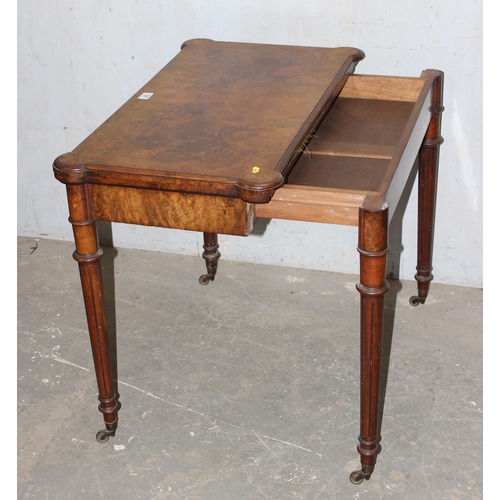 161 - A 19th century burr walnut card table with baize lined interior, concertina mechanism, unnamed but o... 