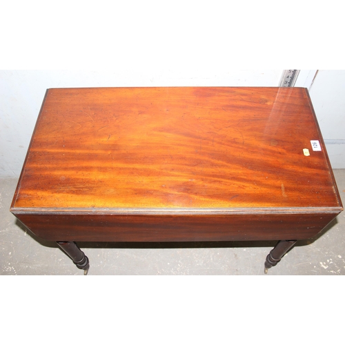 126 - Antique mahogany Pembroke table with brass casters