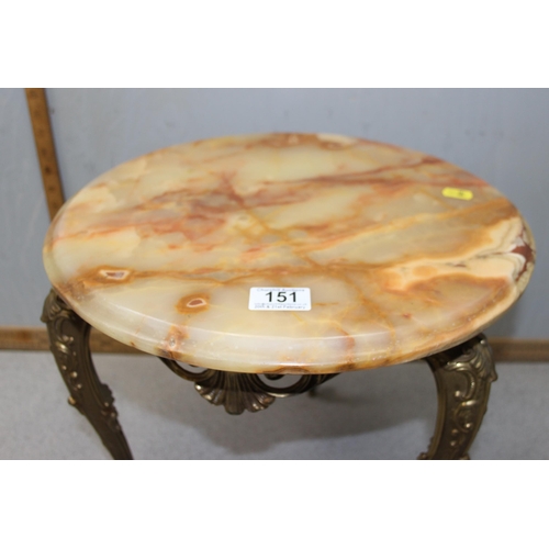 151 - A small onyx topped side table with gilt metal base, approx 40cm in diameter