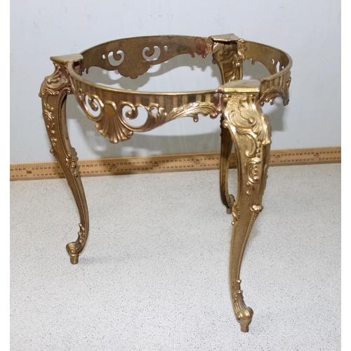 151 - A small onyx topped side table with gilt metal base, approx 40cm in diameter