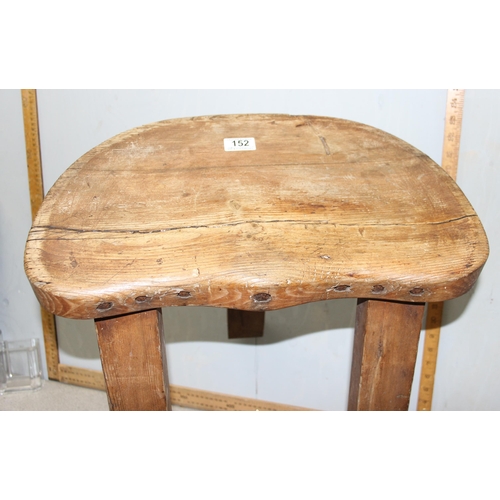 152 - A rustic 3 legged pine stool