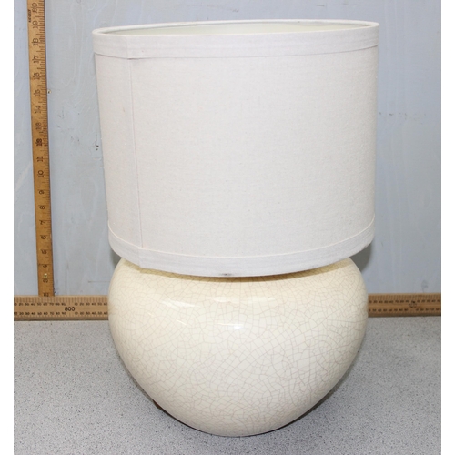 244 - A large cream crackle glaze lamp with shade