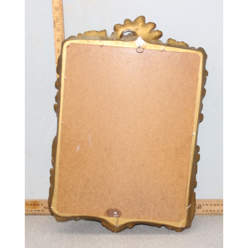 422 - A Rococo style gilt plaster wall mirror