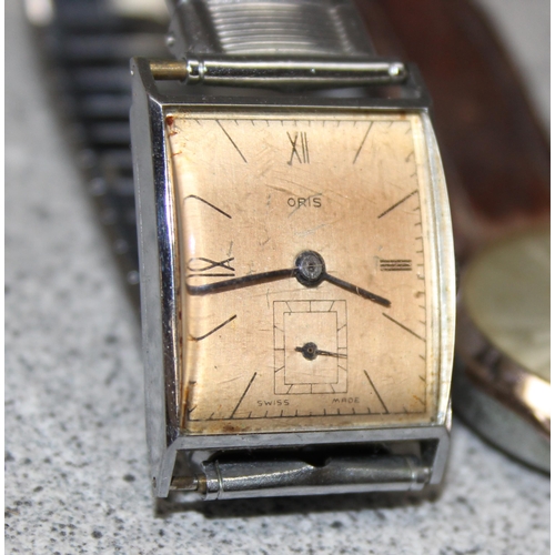 1323 - 4 vintage wrist watches to include a silver coloured example by Oris with subsidiary dial