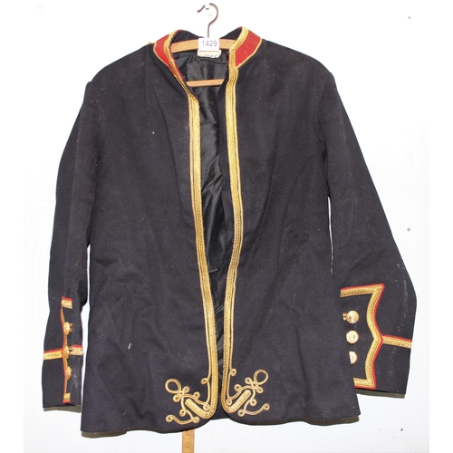 1429 - A 20th century Royal Marines bandsman's jacket, named to Sgt Ledger & P. Nolan