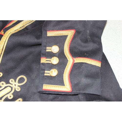 1429 - A 20th century Royal Marines bandsman's jacket, named to Sgt Ledger & P. Nolan