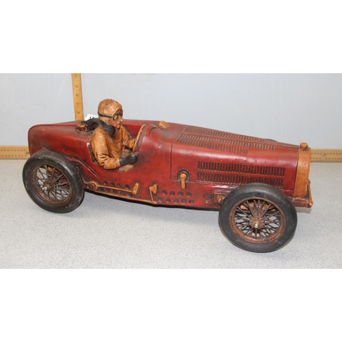 1528 - A large model of an early 20th century sports car, approx 70cm long