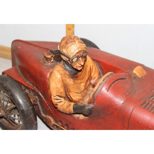 1528 - A large model of an early 20th century sports car, approx 70cm long