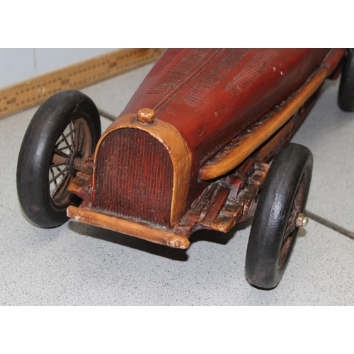 1528 - A large model of an early 20th century sports car, approx 70cm long