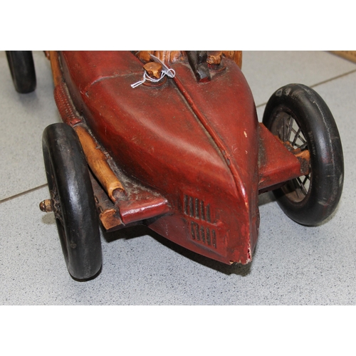 1528 - A large model of an early 20th century sports car, approx 70cm long