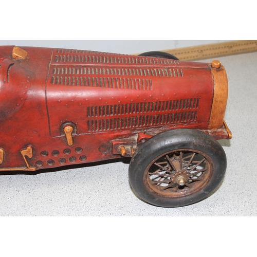 1528 - A large model of an early 20th century sports car, approx 70cm long