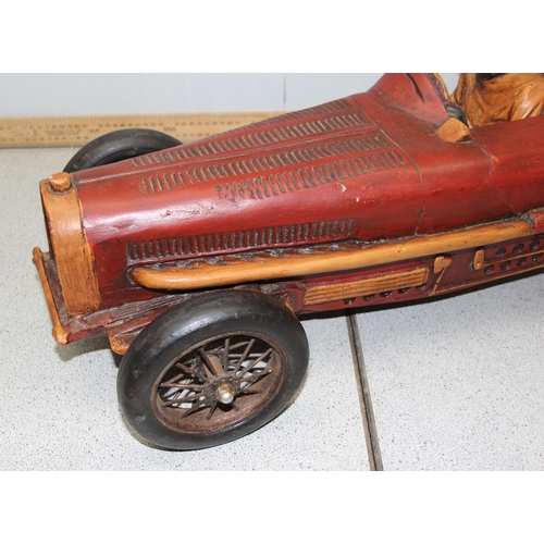 1528 - A large model of an early 20th century sports car, approx 70cm long