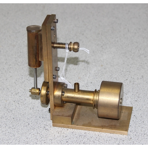 1530 - A live steam engine of brass construction