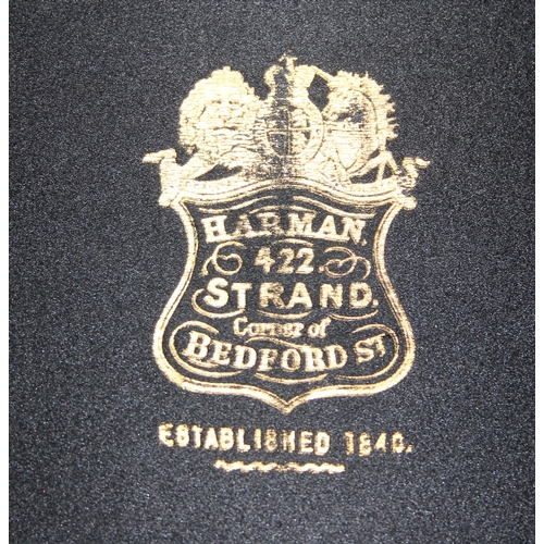 207 - A late 19th or early 20th century collapsible top hat by Harman of Strand, in original box, no size ... 